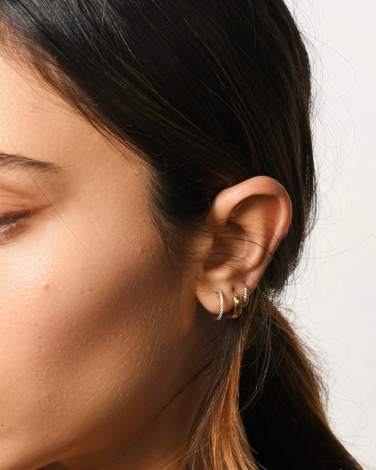 Twisted Petite Hoops, styled photo