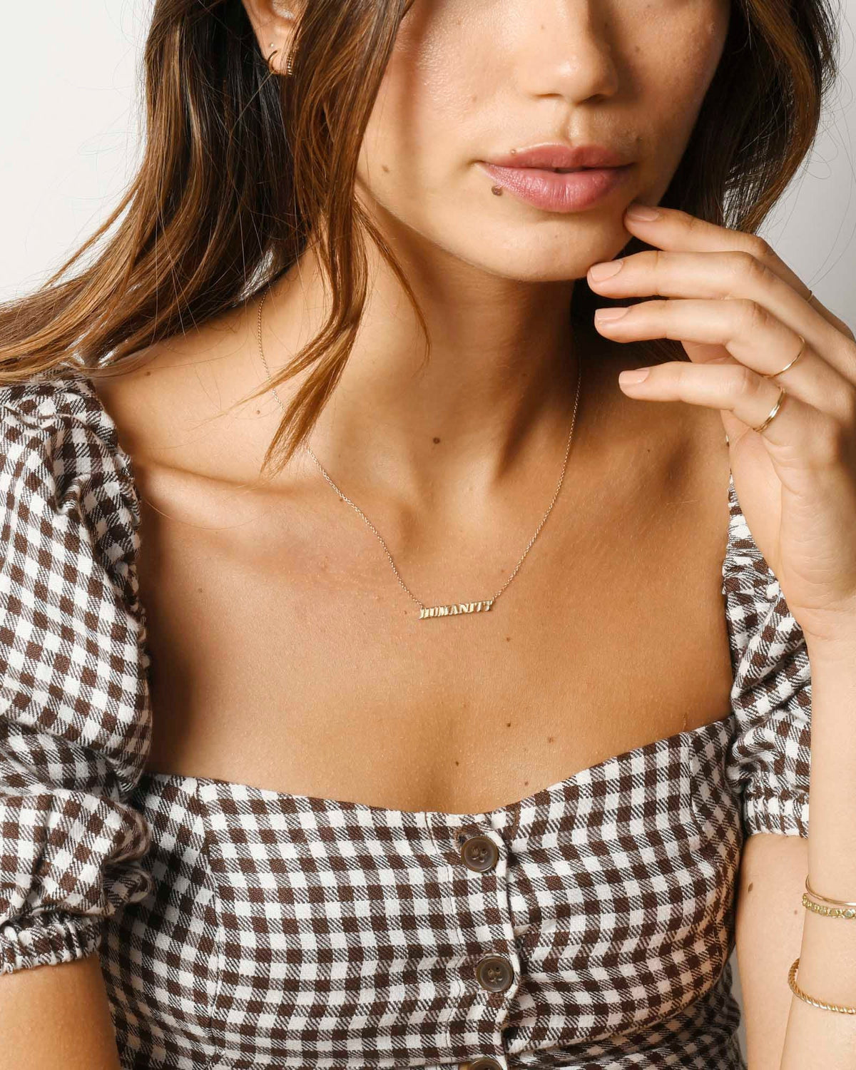 AGJ x This is About Humanity Necklace, styled photo