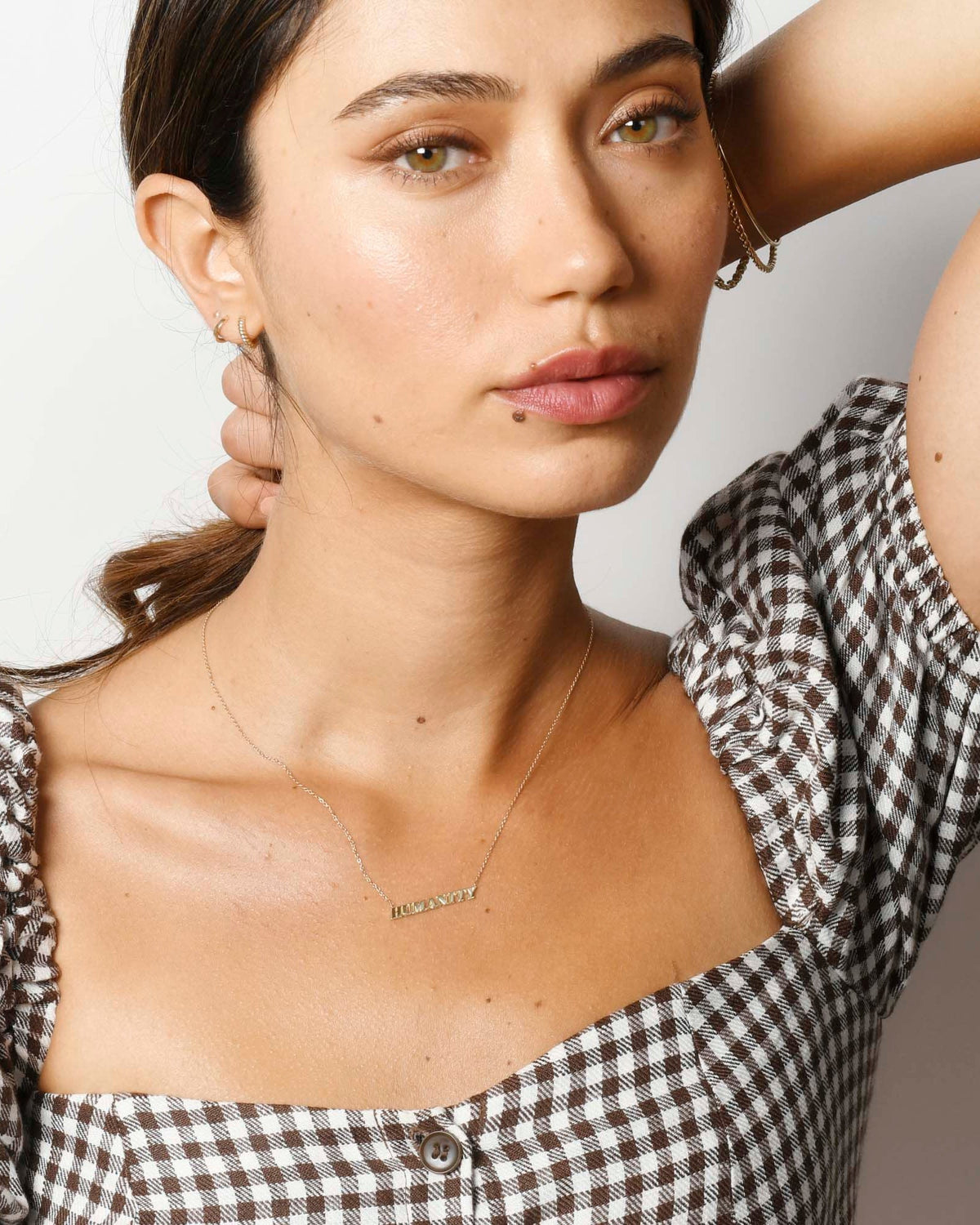 AGJ x This is About Humanity Necklace, styled photo